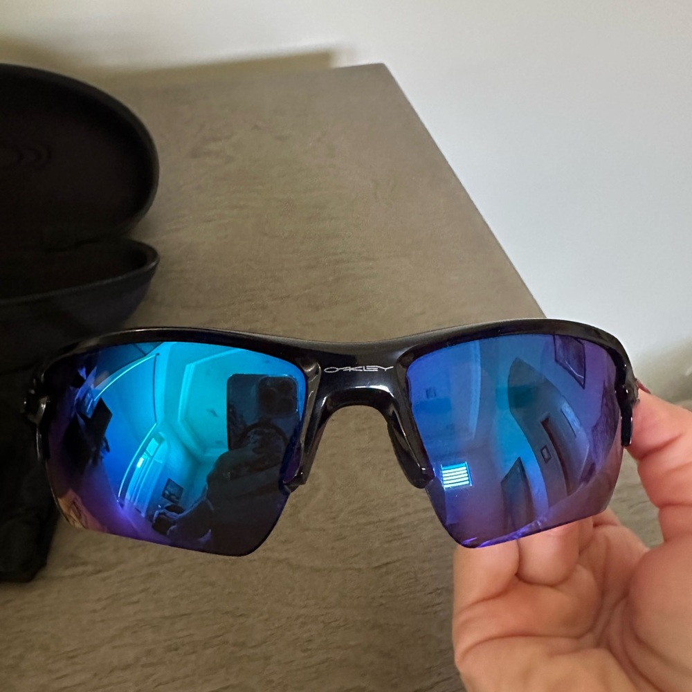 New, never worn, Oakley Polished Black Sunglasses